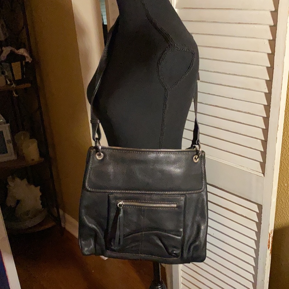 —-SOLD—- Like new only used once. Leather cross body purse.